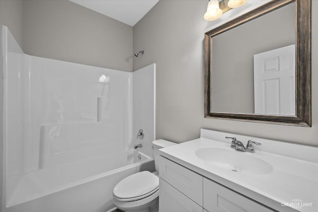 full bathroom with vanity, shower / bathtub combination, and toilet