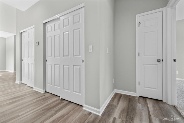 hallway featuring light hardwood / wood-style floors