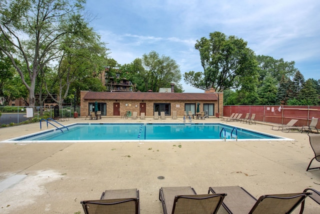 view of pool with a patio area