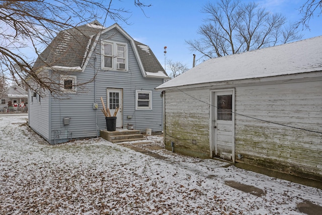 view of snow covered property