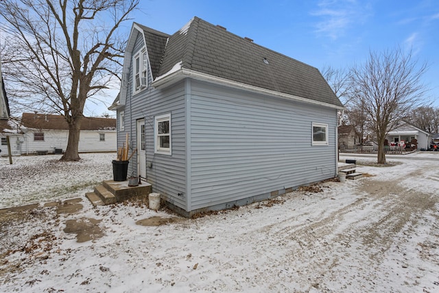 view of snow covered property