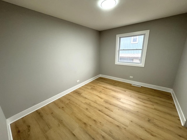 empty room featuring light hardwood / wood-style flooring