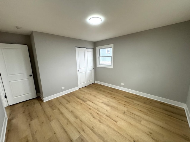 unfurnished bedroom with light hardwood / wood-style floors