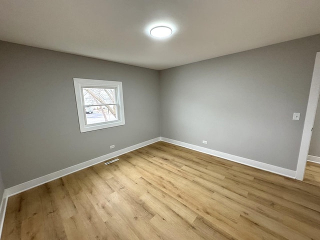 empty room featuring light hardwood / wood-style flooring