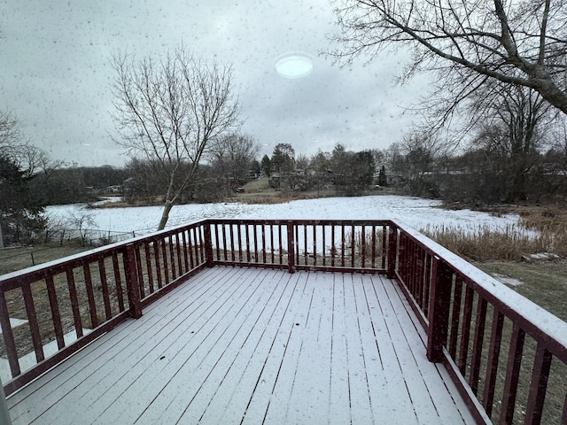 view of snow covered deck