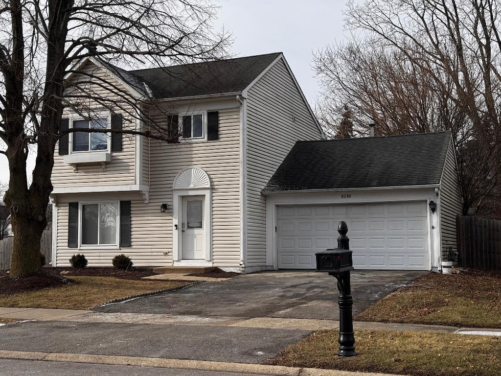 view of front of home featuring a garage