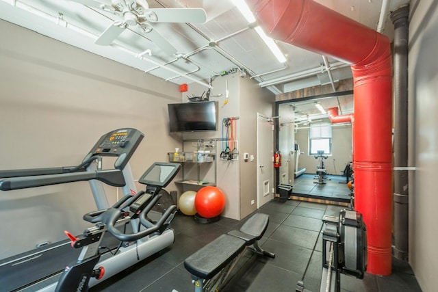 workout area with ceiling fan