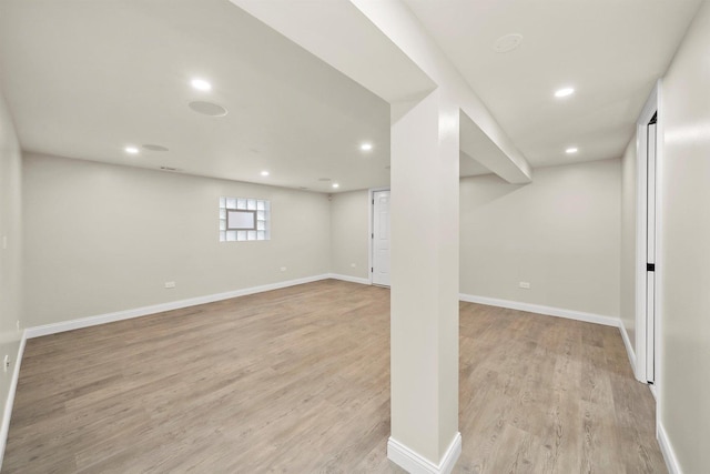 basement featuring light hardwood / wood-style flooring