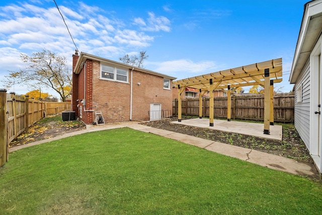 view of yard featuring a pergola, cooling unit, and a patio