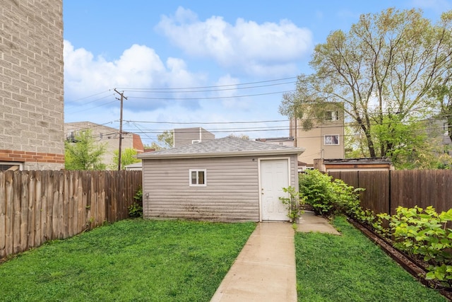 view of outdoor structure with a yard