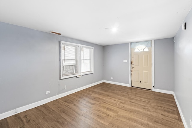 foyer with light hardwood / wood-style floors