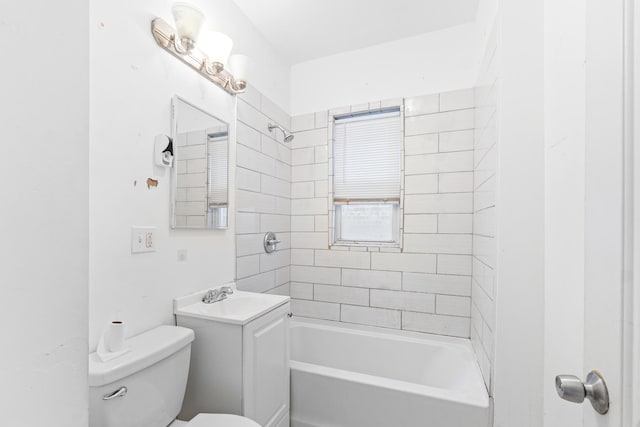 full bathroom with vanity, toilet, and tiled shower / bath combo