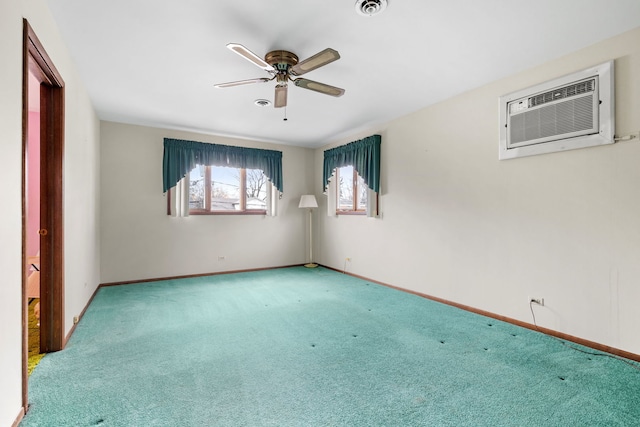 unfurnished room with ceiling fan, carpet, and a wall mounted air conditioner