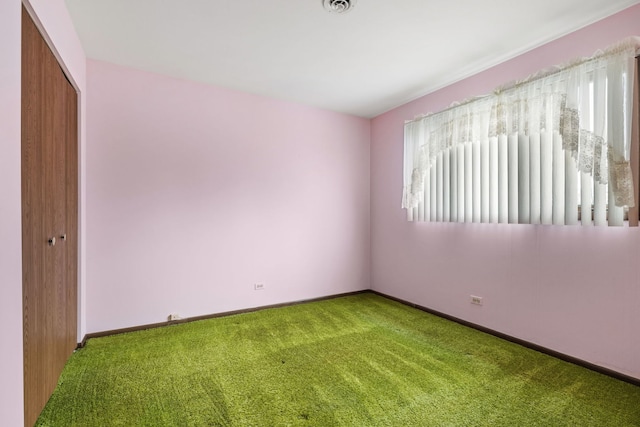 spare room with carpet floors