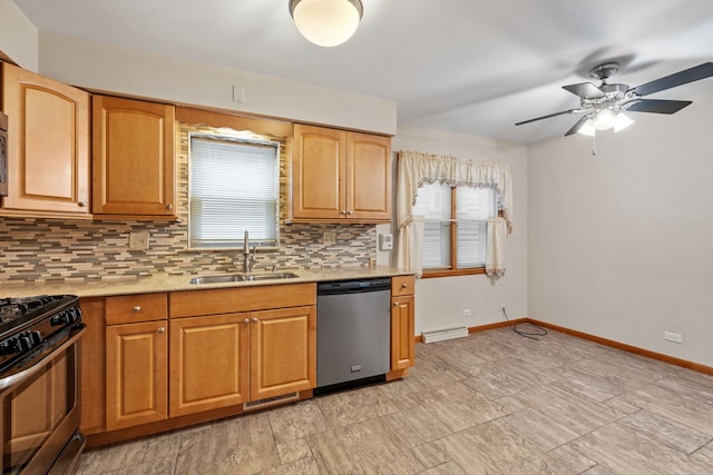 kitchen with ceiling fan, sink, stainless steel dishwasher, range with gas stovetop, and decorative backsplash