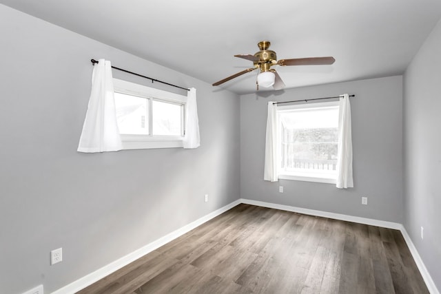 unfurnished room featuring hardwood / wood-style flooring and ceiling fan