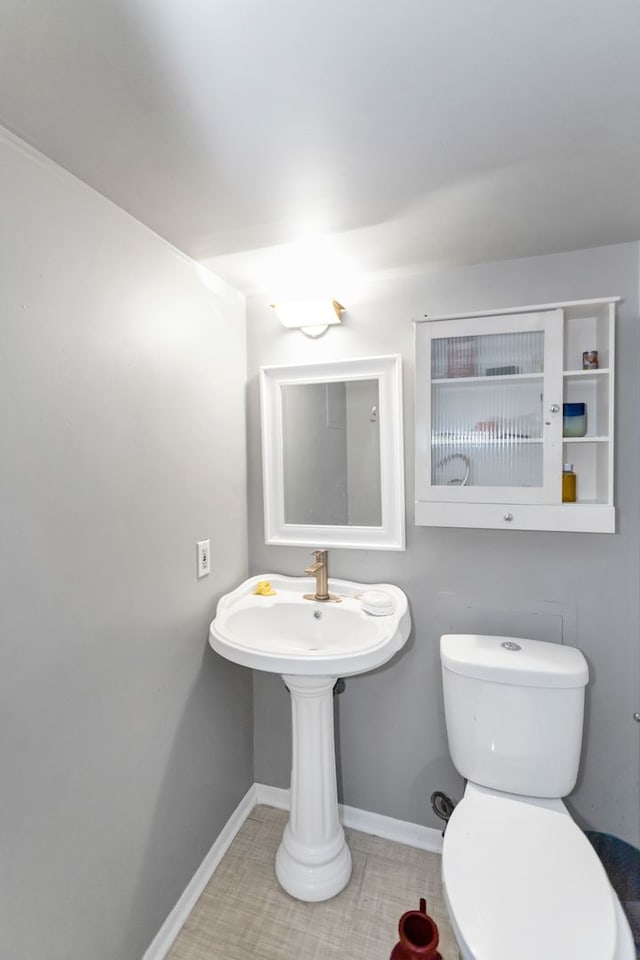 bathroom featuring toilet