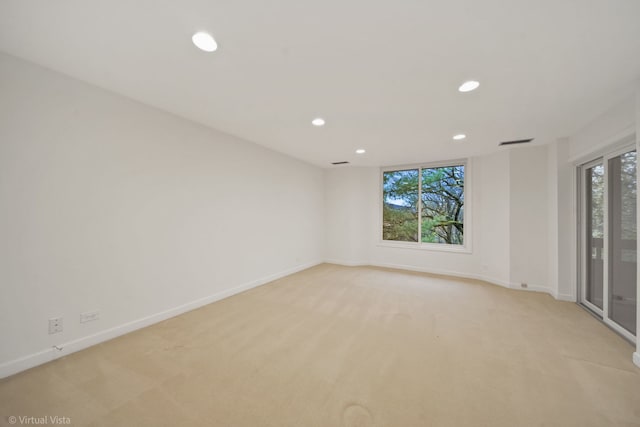 view of carpeted spare room