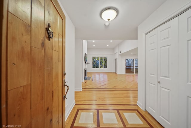 hallway featuring light hardwood / wood-style floors