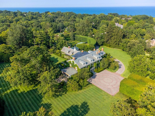 birds eye view of property with a water view and a rural view