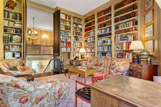 living area featuring a chandelier