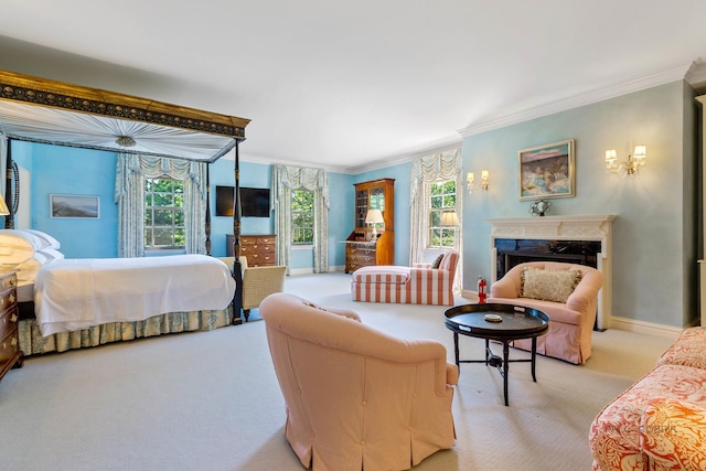 carpeted bedroom featuring crown molding, a high end fireplace, and multiple windows