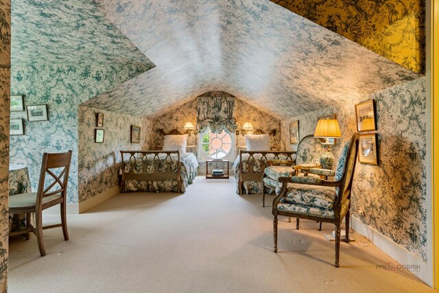 carpeted bedroom featuring vaulted ceiling