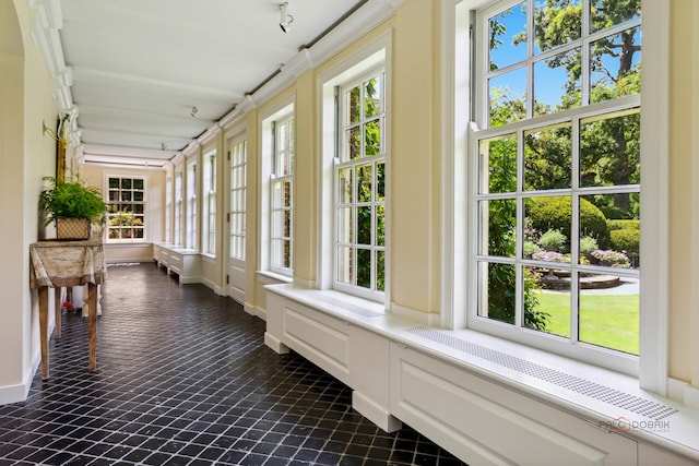 view of unfurnished sunroom