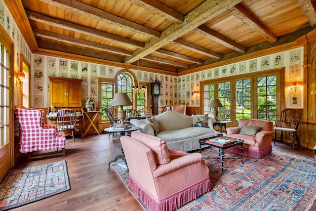 living room with beamed ceiling, wood-type flooring, plenty of natural light, and wood ceiling