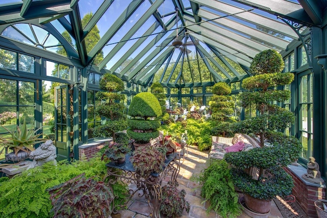 unfurnished sunroom with vaulted ceiling and a wealth of natural light