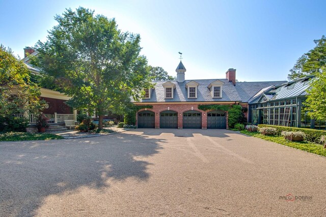 view of front of property featuring a garage