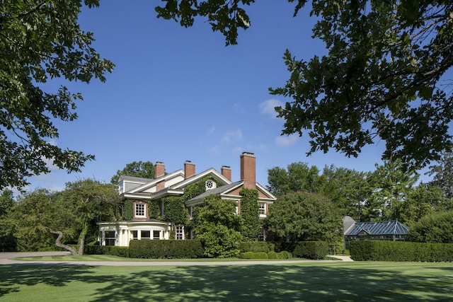 exterior space featuring a lawn