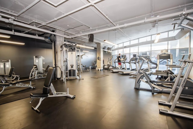 workout area featuring expansive windows