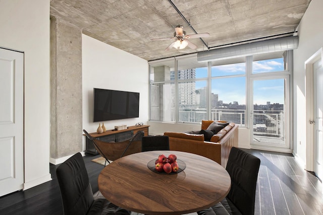 dining space featuring hardwood / wood-style flooring and ceiling fan