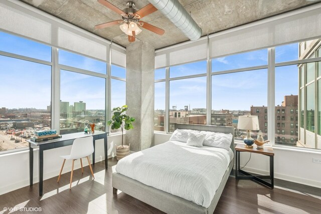 bedroom featuring dark hardwood / wood-style flooring