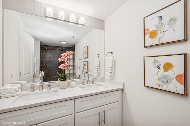 bathroom with vanity and a shower with shower curtain