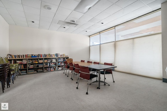 dining space featuring a paneled ceiling