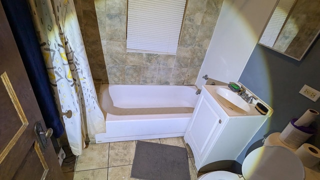 bathroom with tile patterned floors, vanity, and toilet