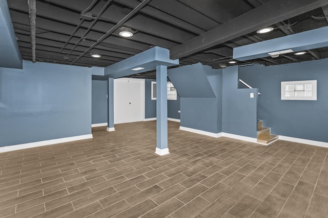 basement featuring hardwood / wood-style floors