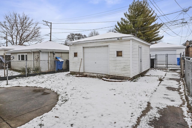 view of snow covered garage