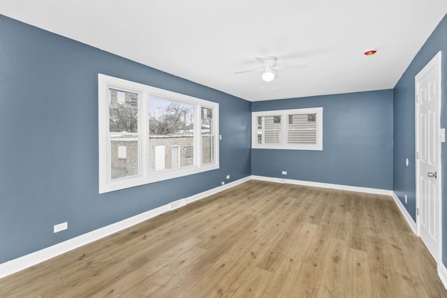 unfurnished room with light hardwood / wood-style floors and ceiling fan