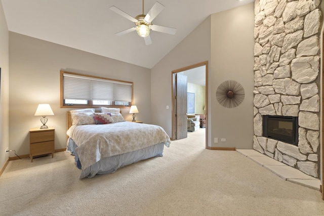 bedroom with a fireplace, light colored carpet, high vaulted ceiling, and ceiling fan