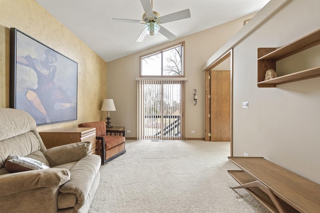 carpeted living room with high vaulted ceiling and ceiling fan