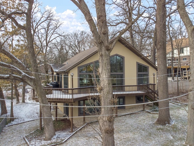 view of snow covered house