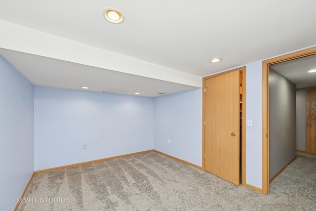 basement with light colored carpet