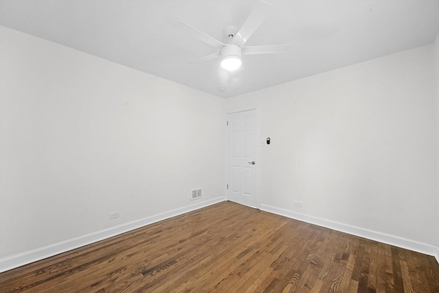 empty room with ceiling fan and wood-type flooring