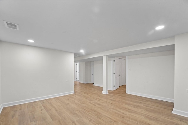 basement featuring light wood-type flooring