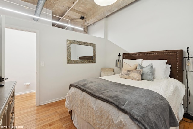 bedroom with light wood-type flooring