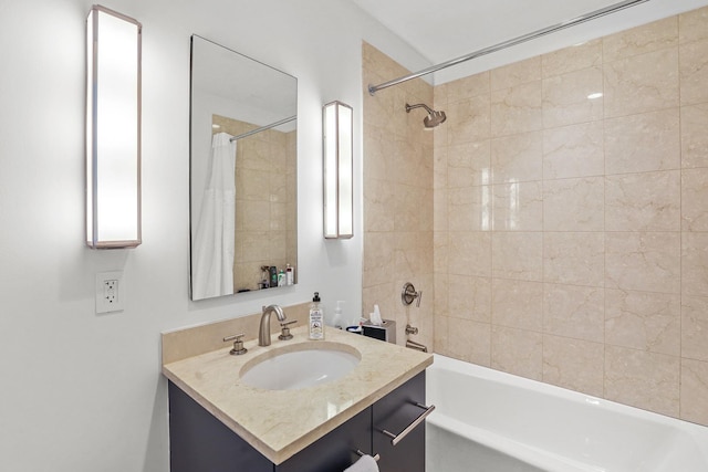 bathroom with vanity and shower / bathtub combination with curtain