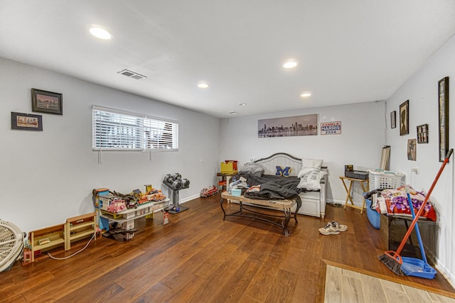 game room with wood-type flooring